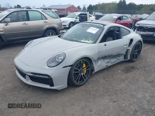 2025 Porsche 911 Turbo with VIN WP0AD2A99SS265136, listed as a IAAI auction lot 41924492 with 352 mi miles. Bid and sale history available at carsss.com. Image 2.