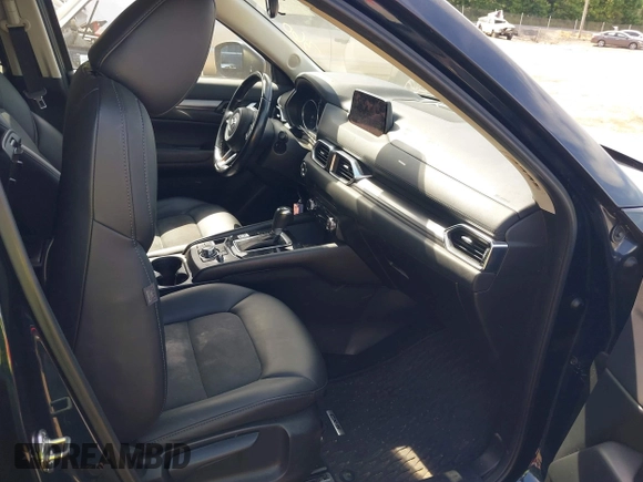 2017 Mazda CX-5 Touring z VIN JM3KFBCL5H0133493, wystawiony jako IAAI lot #39666644 z przebiegiem 125 048 mil mil oraz . Historia ofert i sprzedaży dostępna na DreamBid. Obrazek 5.