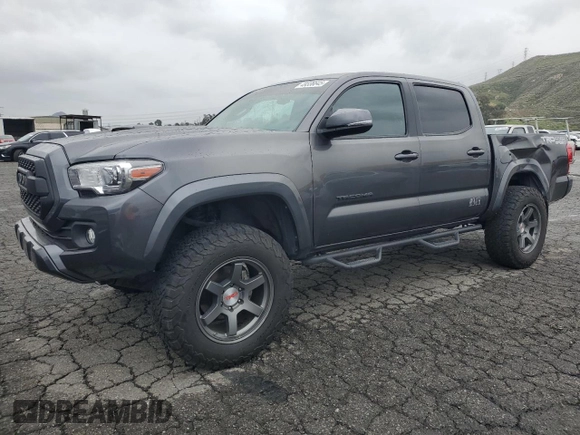 2016 Toyota Tacoma SR with VIN 3TMCZ5AN6GM018536, listed as a Copart auction lot 49336645 with 103,298 mi miles and Salvage Title. Bid and sale history available at carsss.com. Image 1.