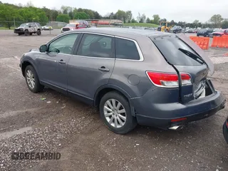 2008 Mazda CX-9 Sport with VIN JM3TB28A180144756, listed as a IAAI auction lot 41965396 with 309,077 mi miles and . Bid and sale history available at DreamBid. Image 3.