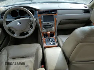 2004 Acura RL w/Navigation System with VIN JH4KA96604C007250, listed as a Copart auction lot 49997655 with 236,342 mi miles and Salvage Title. Bid and sale history available at DreamBid. Image 8.