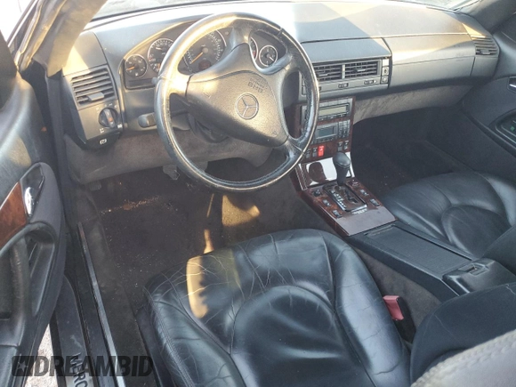 1999 Mercedes-Benz SL-Class with VIN WDBFA68F9XF178143, listed as a Copart auction lot 83255114 with 129,970 mi miles and Salvage Title. Bid and sale history available at carsss.com. Image 8.