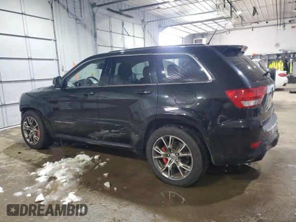 2012 Jeep Grand Cherokee SRT8 with VIN 1C4RJFDJ7CC187475, listed as a Copart auction lot 45191285 with 133,748 mi miles and Salvage Title. Bid and sale history available at carsss.com. Image 2.