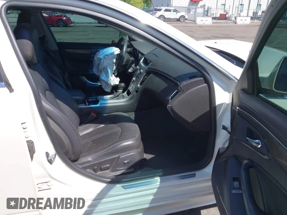 2013 Cadillac CTS Performance with VIN 1G6DK5E37D0138249, listed as a IAAI auction lot 41991166 with 121,133 mi miles and . Bid and sale history available at DreamBid. Image 5.