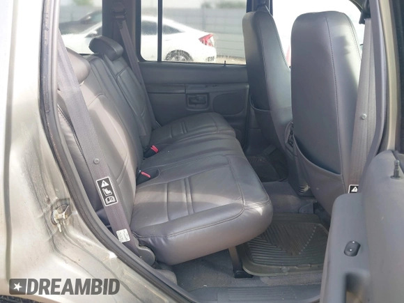 1999 Mercury Mountaineer with VIN 4M2ZU52E1XUJ26317, listed as a IAAI auction lot 42606083 with 126,554 mi miles and . Bid and sale history available at DreamBid. Image 8.