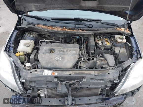 2009 Mazda 5 Sport with VIN JM1CR29L890356690, listed as a IAAI auction lot 41169351 with 118,582 mi miles and . Bid and sale history available at DreamBid. Image 10.