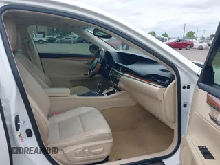 2014 Lexus ES 300h with VIN JTHBW1GG5E2064531, listed as a IAAI auction lot 42119900 with 210,354 mi miles and . Bid and sale history available at DreamBid. Image 5.