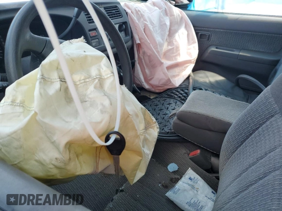2000 Nissan Frontier XE with VIN 1N6DD26S0YC411769, listed as a Copart auction lot 60044125 with Not provided miles and Salvage title. Bid and sale history available at DreamBid. Image 7.