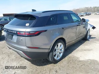 2020 Land Rover Range Rover Velar S z VIN SALYB2EX7LA259607, wystawiony jako IAAI lot #40980294 z przebiegiem 95 967 mil mil oraz . Historia ofert i sprzedaży dostępna na DreamBid. Obrazek 4.