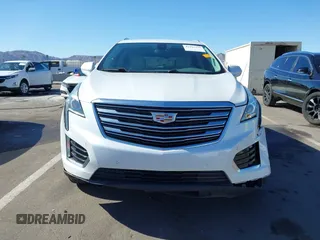 2017 Cadillac XT5 Luxury AWD z VIN 1GYKNDRS8HZ120863, wystawiony jako IAAI lot #42101279 z przebiegiem 100 535 mil mil oraz . Historia ofert i sprzedaży dostępna na DreamBid. Obrazek 13.