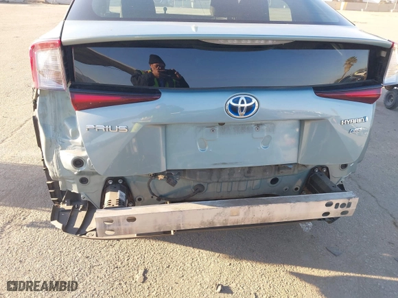 2019 Toyota Prius L Eco with VIN JTDKARFU3K3084191, listed as a IAAI auction lot 41732381 with 179,430 mi miles. Bid and sale history available at carsss.com. Image 6.