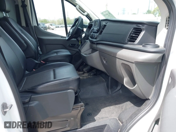 2023 Ford Transit Cargo with VIN 1FTBR1Y82PKA22661, listed as a IAAI auction lot 41768039 with 30,800 mi miles and . Bid and sale history available at DreamBid. Image 5.