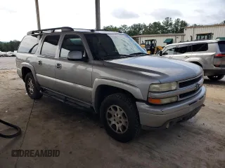 2005 Chevrolet Suburban Z71 with VIN 3GNFK16ZX5G166830, listed as a Copart auction lot 62769755 with 430,459 mi miles and Salvage title. Bid and sale history available at DreamBid. Image 4.