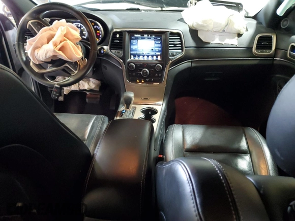 2017 Jeep Grand Cherokee Limited 75th Anniversary with VIN 1C4RJFBT6HC667826, listed as a Copart auction lot 61776815 with 169,327 mi miles and Salvage title. Bid and sale history available at DreamBid. Image 8.