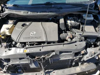 2006 Mazda 5 Sport with VIN JM1CR293460122882, listed as a Copart auction lot 76316404 with 172,163 mi miles and Salvage Title. Bid and sale history available at DreamBid. Image 11.