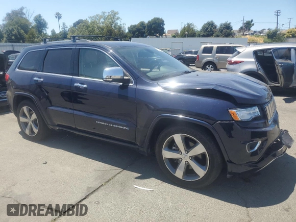 2015 Jeep Grand Cherokee Overland with VIN 1C4RJFCG0FC629863, listed as a Copart auction lot 63098475 with 92,426 mi miles and Salvage title. Bid and sale history available at DreamBid. Image 4.