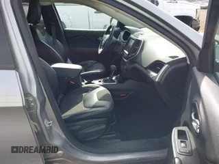 2015 Jeep Cherokee Trailhawk with VIN 1C4PJMBS0FW522182, listed as a IAAI auction lot 42544508 with 74,910 mi miles and . Bid and sale history available at DreamBid. Image 5.