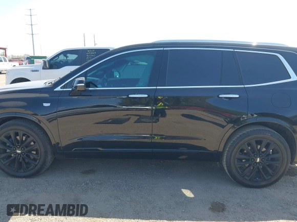 2021 Cadillac XT6 Premium Luxury z VIN 1GYKPCRS9MZ221232, wystawiony jako IAAI lot #41783431 z przebiegiem 69 367 mil mil oraz . Historia ofert i sprzedaży dostępna na DreamBid. Obrazek 15.