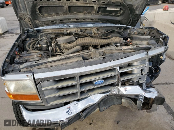 1994 Ford Bronco Custom with VIN 1FMEU15H7RLA79348, listed as a Copart auction lot 76497714 with 204,875 mi miles and Salvage Title. Bid and sale history available at DreamBid. Image 12.