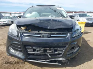 2014 Ford Escape Titanium with VIN 1FMCU9J93EUE27803, listed as a IAAI auction lot 42028249 with 131,194 mi miles and . Bid and sale history available at DreamBid. Image 11.