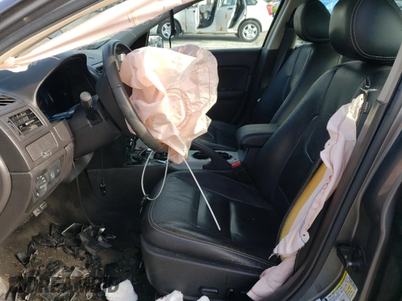 2012 Ford Fusion SEL with VIN 3FAHP0JA6CR137380, listed as a Copart auction lot 83534014 with Not provided miles and Salvage title. Bid and sale history available at DreamBid. Image 7.