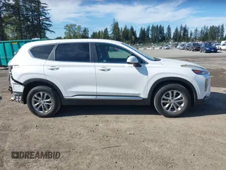 2019 Hyundai Santa Fe SE with VIN 5NMS2CAD0KH098259, listed as a IAAI auction lot 42075356 with 55,163 mi miles and . Bid and sale history available at DreamBid. Image 14.