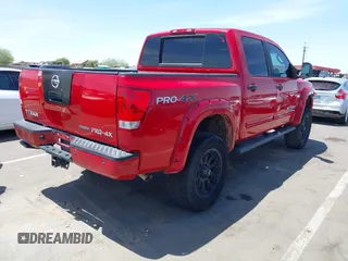 2011 Nissan Titan Pro-4X z VIN 1N6BA0ECXBN317554, wystawiony jako IAAI lot #42310942 z przebiegiem 152 264 mil mil oraz . Historia ofert i sprzedaży dostępna na DreamBid. Obrazek 4.