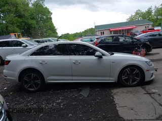 2018 Audi A4 Premium Plus z VIN WAUENAF46JA149268, wystawiony jako IAAI lot #42313647 z przebiegiem 88 562 mil mil oraz . Historia ofert i sprzedaży dostępna na DreamBid. Obrazek 13.