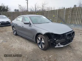 2024 BMW i4 eDrive35 with VIN WBY43AW05RFT22034, listed as a IAAI auction lot 41545162 with 1,499 mi miles. Bid and sale history available at carsss.com. Image 1.