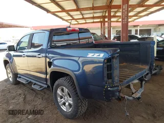 2018 Chevrolet Colorado 4WD Z71 z VIN 1GCGTDEN9J1231315, wystawiony jako IAAI lot #42440943 z przebiegiem 171 061 mil mil oraz . Historia ofert i sprzedaży dostępna na DreamBid. Obrazek 3.