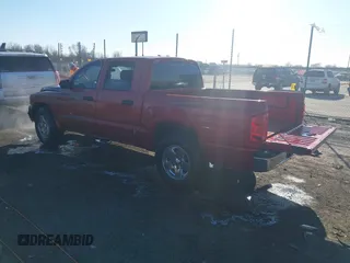 2006 Dodge Dakota SLT with VIN 1D7HE48K36S623701, listed as a IAAI auction lot 41695564 with 130,147 mi miles and . Bid and sale history available at carsss.com. Image 3.