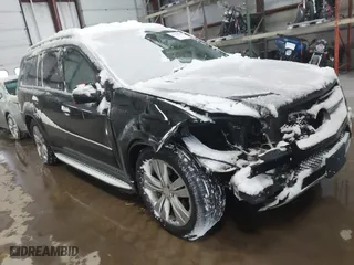 2010 Mercedes-Benz GL-Class GL 450 with VIN 4JGBF7BE0AA543199, listed as a IAAI auction lot 41328290 with 144,119 mi miles. Bid and sale history available at carsss.com. Image 1.