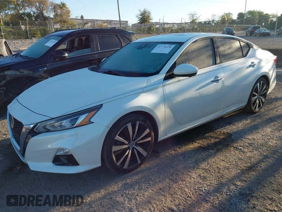 2019 Nissan Altima 2.5 Platinum with VIN 1N4BL4FV3KC116794, listed as a IAAI auction lot 41779270 with 89,086 mi miles. Bid and sale history available at carsss.com. Image 2.