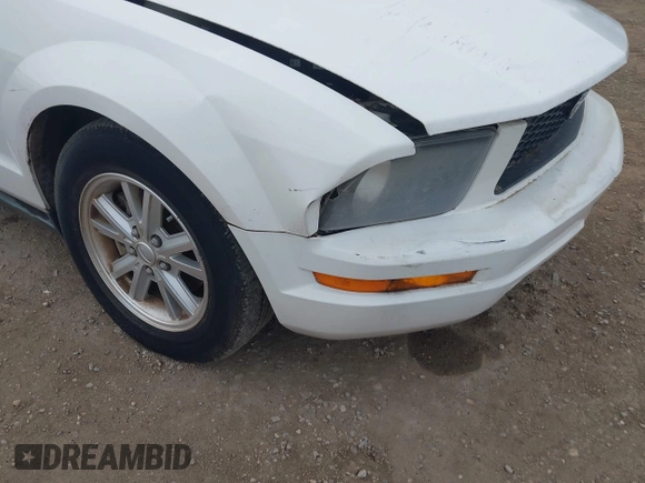 2007 Ford Mustang Deluxe with VIN 1ZVFT80N875359456, listed as a IAAI auction lot 42205108 with 75,588 mi miles and . Bid and sale history available at carsss.com. Image 6.