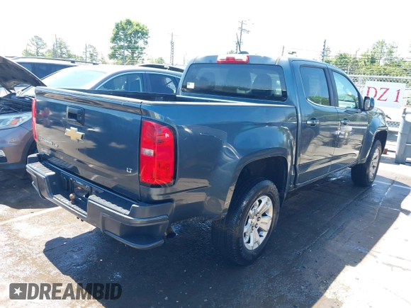 2019 Chevrolet Colorado 2WD LT with VIN 1GCGSCEN9K1110461, listed as a IAAI auction lot 42235068 with 113,953 mi miles and . Bid and sale history available at DreamBid. Image 4.