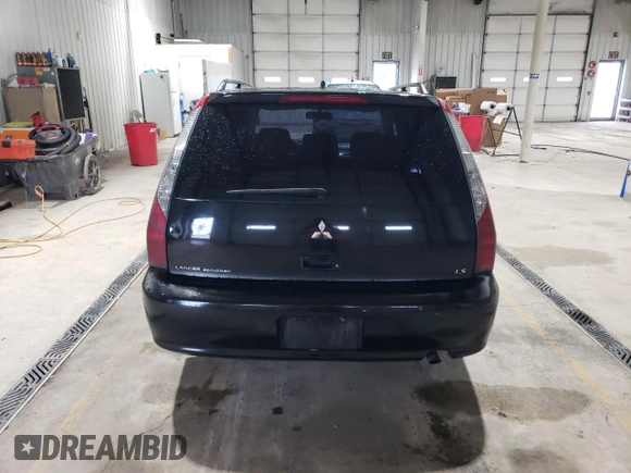 2004 Mitsubishi Lancer z VIN JA3AD29F44U024617, wystawiony jako Copart lot #51847765 z przebiegiem 172 585 mil mil oraz Szkoda całkowita • Salvage title. Historia ofert i sprzedaży dostępna na DreamBid. Obrazek 6.