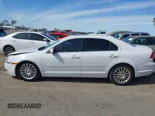 2006 Mercury Milan Premier with VIN 3MEHM08166R633064, listed as a IAAI auction lot 41648193 with 142,589 mi miles and . Bid and sale history available at DreamBid. Image 14.