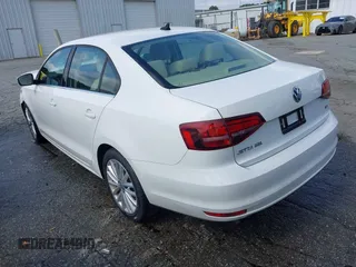 2016 Volkswagen Jetta SEL z VIN 3VWL07AJ0GM376263, wystawiony jako IAAI lot #42728100 z przebiegiem 213 315 mil mil oraz . Historia ofert i sprzedaży dostępna na DreamBid. Obrazek 3.