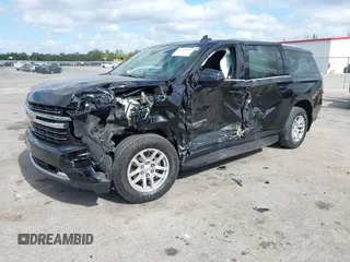 2022 Chevrolet Suburban LT z VIN 1GNSCCKD2NR201474, wystawiony jako IAAI lot #42150033 z przebiegiem 157 659 mil mil oraz . Historia ofert i sprzedaży dostępna na DreamBid. Obrazek 2.