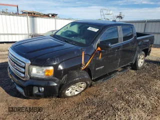 2016 GMC Canyon 2WD SLE with VIN 1GTG5CE35G1256661, listed as a Copart auction lot 82244644 with 104,496 mi miles and Clean Title. Bid and sale history available at carsss.com. Image 1.