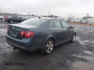 2009 Volkswagen Jetta SE z VIN 3VWRZ71K49M016683, wystawiony jako IAAI lot #41530644 z przebiegiem 106 148 mil mil oraz . Historia ofert i sprzedaży dostępna na DreamBid. Obrazek 4.