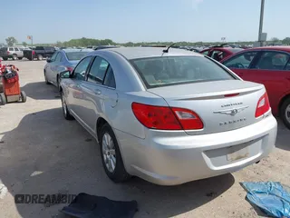 2010 Chrysler Sebring Touring with VIN 1C3CC4FB9AN115922, listed as a IAAI auction lot 42015051 with 152,305 mi miles and . Bid and sale history available at DreamBid. Image 3.