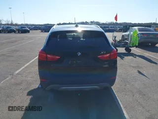 2018 BMW X1 xDrive28i with VIN WBXHT3C36J5F91110, listed as a IAAI auction lot 41757293 with 80,327 mi miles. Bid and sale history available at carsss.com. Image 16.