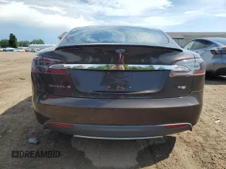 2014 Tesla Model S 60 with VIN 5YJSA1H17EFP31977, listed as a Copart auction lot 62521525 with Not provided miles and Clean title. Bid and sale history available at DreamBid. Image 6.