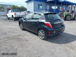 2012 Toyota Yaris L with VIN JTDKTUD35CD529596, listed as a IAAI auction lot 41439354 with 87,493 mi miles. Bid and sale history available at carsss.com. Image 3.