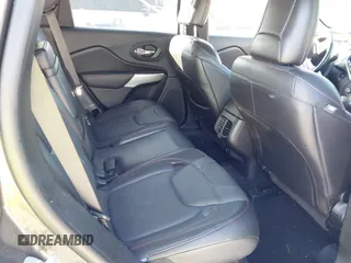 2018 Jeep Cherokee Trailhawk with VIN 1C4PJMBX7JD517299, listed as a IAAI auction lot 42022770 with 62,865 mi miles. Bid and sale history available at carsss.com. Image 8.