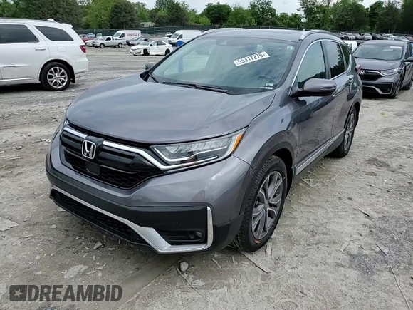 2020 Honda CR-V Touring z VIN 7FARW1H97LE009965, wystawiony jako Copart lot #55317275 z przebiegiem 47 369 mil mil oraz Szkoda całkowita • Salvage title. Historia ofert i sprzedaży dostępna na DreamBid. Obrazek 15.