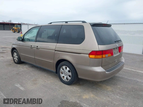 2004 Honda Odyssey EX-L with VIN 5FNRL18744B034830, listed as a IAAI auction lot 42052008 with 182,178 mi miles and . Bid and sale history available at DreamBid. Image 3.