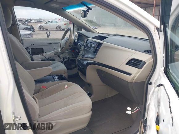 2014 Toyota Sienna LE AAS with VIN 5TDKK3DC6ES526159, listed as a IAAI auction lot 41522210 with 123,563 mi miles and . Bid and sale history available at DreamBid. Image 5.