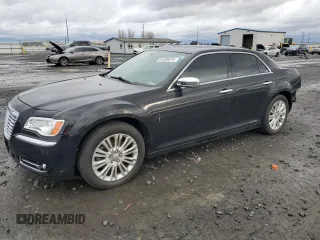 2013 Chrysler 300 C with VIN 2C3CCAKG4DH659709, listed as a Copart auction lot 84390074 with 47,174 mi miles and Salvage Title. Bid and sale history available at DreamBid. Image 1.